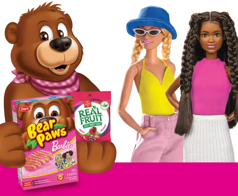 Pauley holding Barbie branded Bear Paws and a package of Real Fruit Snacks and Barbies ready for the beach